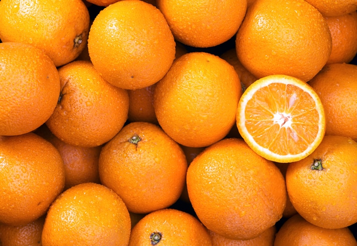 Oranges Raw fruit and vegetable backgrounds overhead perspective, part of a set collection of healthy organic fresh produce