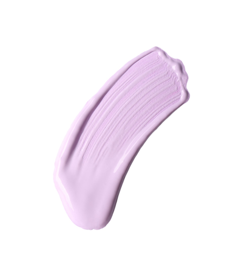 Stroke of purple color correcting concealer isolated on white